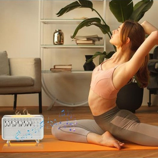 A woman practices yoga on an orange mat in her living room, while soothing sounds play from the Dropshipman 3 In 1 Bluetooth Speaker White Noise Speaker. Plants and shelves are visible in the background.