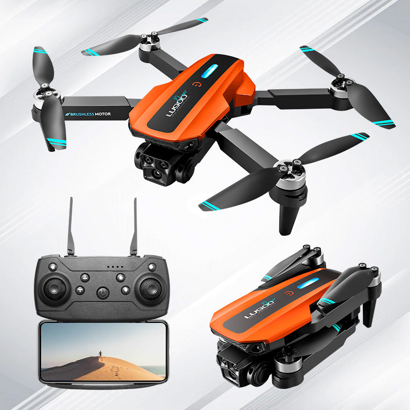 The Dropshipman LU900Dron Drone, a bright orange foldable quadcopter mini drone with black propellers, is shown flying and folded. Below, its black remote controller holds a smartphone displaying a person on a sandy dune.