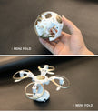 Top: A hand holds a compact, spherical High-definition Aerial Photography of Drones by Dropshipman. Bottom: The same drone is unfolded, showing its four arms and propellers extended, ready for flight.