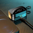 A close-up of the FLIPSTYLEZLLC Wireless Bluetooth Earphones charging case, with LED battery display and USB cable, sits by a smartphone on a dark textured surface. Compatible with Samsung Galaxy Note 20 S10 S20, Huawei, and Xiaomi devices.