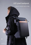 A person in a black hooded jacket wears a sleek Bluetooth Projection Backpack by Dropshipman with an LED panel. The text says 