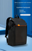 A stylish black Dropshipman Bluetooth Projection Backpack with orange accents is shown on a blue background, featuring multifunctionality, high-capacity design, water-resistant fabric, and a sleek unisex look.