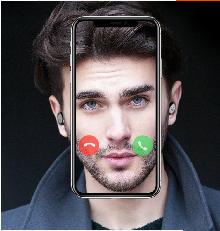 A man with dark hair and a beard wears Dropshipman F9 wireless headphones. A smartphone, showing incoming call icons, is positioned in front of his face, aligning perfectly with his features.