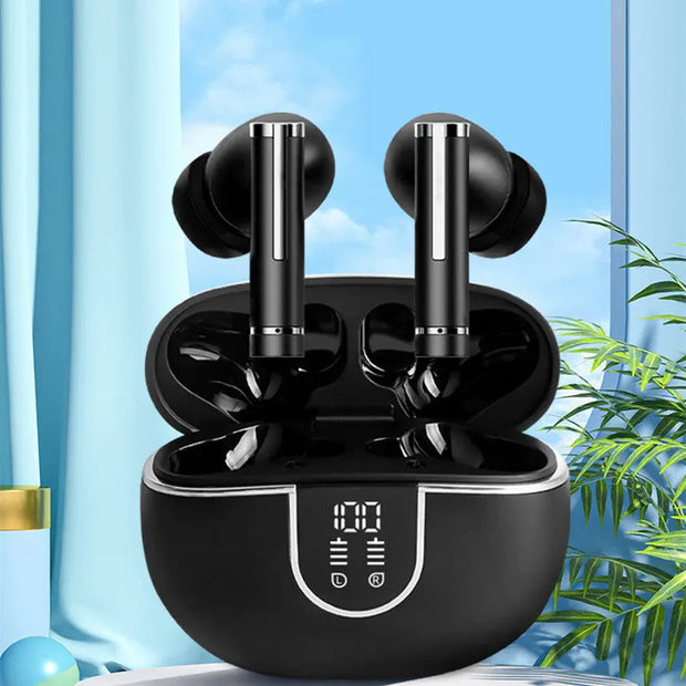 A pair of black Ultra-long Premium earbuds by Dropshipman with a charging case featuring a digital screen, displayed on a surface with a blue background, a window, and green plant leaves. Premium audio, sleekly designed for gamers.