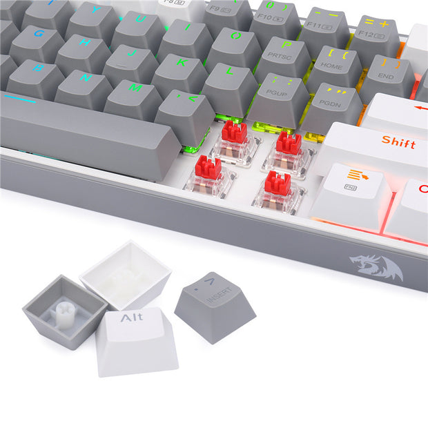 A close-up of the Dropshipman Wireless Cyber key Bluetooth 61 Key Mechanical Computer Keyboard shows several keycaps removed to reveal red switches, with three loose laser-engraved keycaps ("Alt," up arrow, and "Shift") next to it.