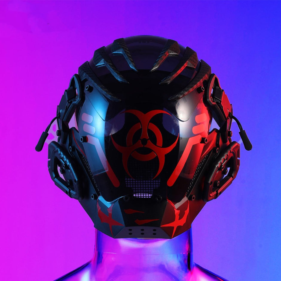 The Dropshipman Bioweapon Tech Mask is a black, full-face helmet with red biohazard symbols and mechanical details, shown on a clear mannequin bust under blue and purple gradient lighting.