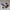 The Dropshipman Retroid Pocket 5 Open Source RP5 Game Console is shown in purple, white, and black on a gray surface with 