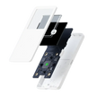 An exploded view of the HeadphoneHeat OneKey Mini Offline Crypto Wallet, showcasing its internal components. Visible parts include a white outer casing, a small display screen, a black circuit board with electronic elements, and additional internal layers that fit into the outer shell. All parts are floating apart in alignment.
