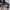 A person sits on steps, holding a smartphone with a pixel art creation app open. Beside them is the HeadphoneHeat DIVOOM Pixoo M Backpack Men 15 Inch Waterproof, showcasing a colorful pixel heart design on its 16 × 16 RGB LED screen. The text 
