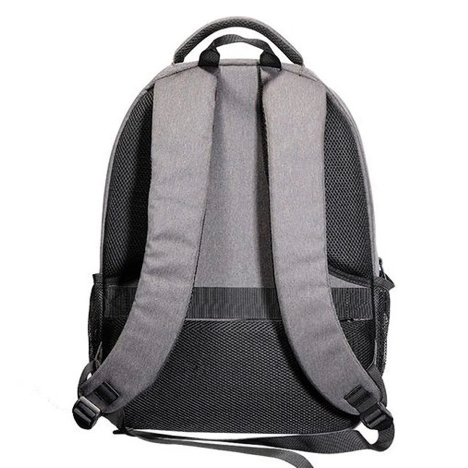 Back view of the BSIDE 3D Holographic Projector Backpack by HeadphoneHeat in gray with black accents, featuring adjustable padded shoulder straps, a top handle, and side mesh pockets. The thick padding on the straps ensures comfort, while its certified quality design maintains a simple and functional aesthetic.