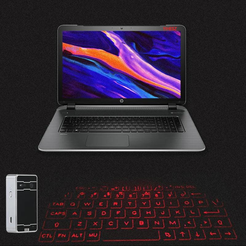 A Dropshipman Bluetooth Virtual Laser Keyboard projects a red keyboard onto the surface from a mini device on the left, under a laptop with a vibrant display, all set against a black background.