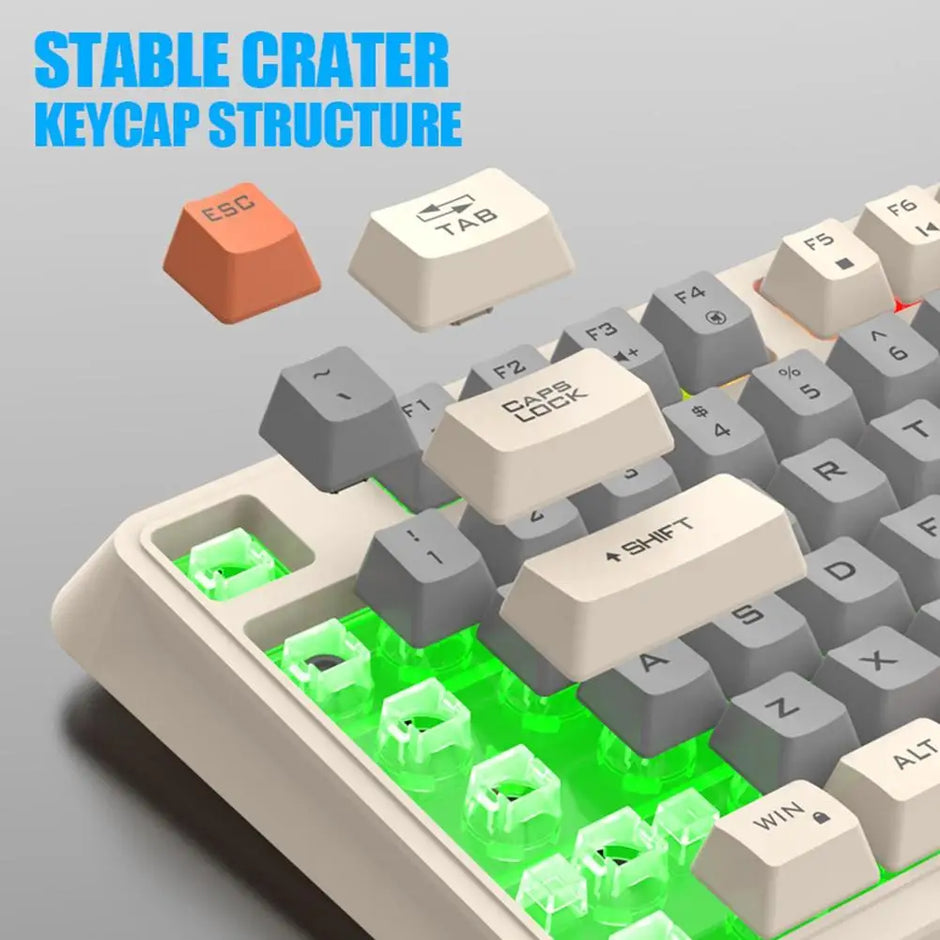 A K82 Mechanical Gaming Keyboard by HeadphoneHeat, featuring removed keys to reveal its green backlit switches. The image emphasizes the "Stable Crater Keycap Structure," drawing attention to the orange Esc key, as well as the Tab and Shift keys, ideal for an elevated gaming experience.