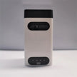 The Dropshipman Bluetooth Virtual Laser Keyboard is a rectangular white device with a black top and two black horizontal oval panels, shown against a plain gray background.