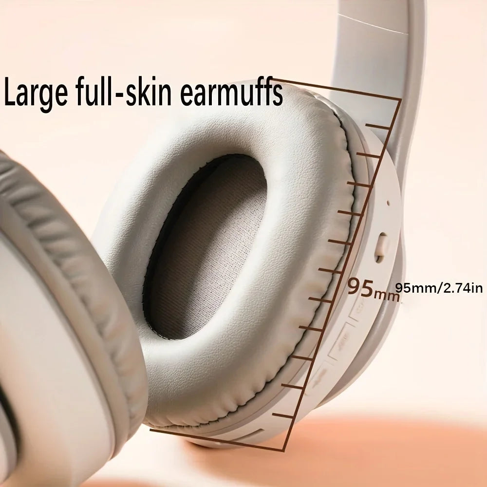 Close-up of the HeadphoneHeat Bluetooth HIFI Wireless Stereo headphones, featuring white full-skin earmuffs with a diameter of 95mm (or 2.74 inches) to provide dynamic sound quality. The text reads 