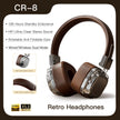 HeadphoneHeat's CR-8 DUTRIEUX Classic Over Ear Stereo Headphones feature a retro brown and silver design with rotatable, foldable capabilities. They offer 180 hours of standby time, HiFi stereo sound, sound isolation, and Hybrid Connectivity via Bluetooth 5.3. The matte metal construction and leather-like texture add the finishing touch to their classic aesthetic.