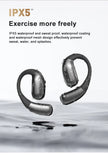 Two ERAZER XF31 Bluetooth Translation Earbuds by HeadphoneHeat, featuring an IPX5 waterproof rating, are surrounded by splashes of water. The text emphasizes their resistance to sweat, water, and splashes, highlighting their suitability for exercise.
