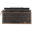 The Retro Typewriter Mechanical Keyboard by HeadphoneHeat features round black keys, a dark brown casing, and a silver side handle for a typewriter look. It supports Bluetooth 5.0 and includes an integrated holder for tablets or phones at the back.