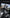 A set of Esports ZIXZEX Game Bluetooth TWS Earbuds from HeadphoneHeat is displayed in the foreground, with one earbud placed beside them. In the background, a smartphone displays an action game featuring armed characters. The image features an 