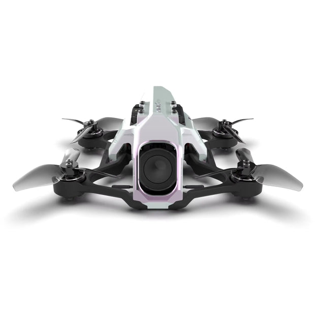 Front view of the HeadphoneHeat SpeedyBee Mario Mini25 PW RC racing drone featuring four black propellers, a central 1080p FHD camera, and a sleek white body, displayed on a white background.