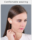 A person with long brown hair is wearing a white HeadphoneHeat Esports ZIXZEX Game Bluetooth TWS Earbud in their right ear. They are looking slightly to the left and touching their ear. The background is light gray, and the text 