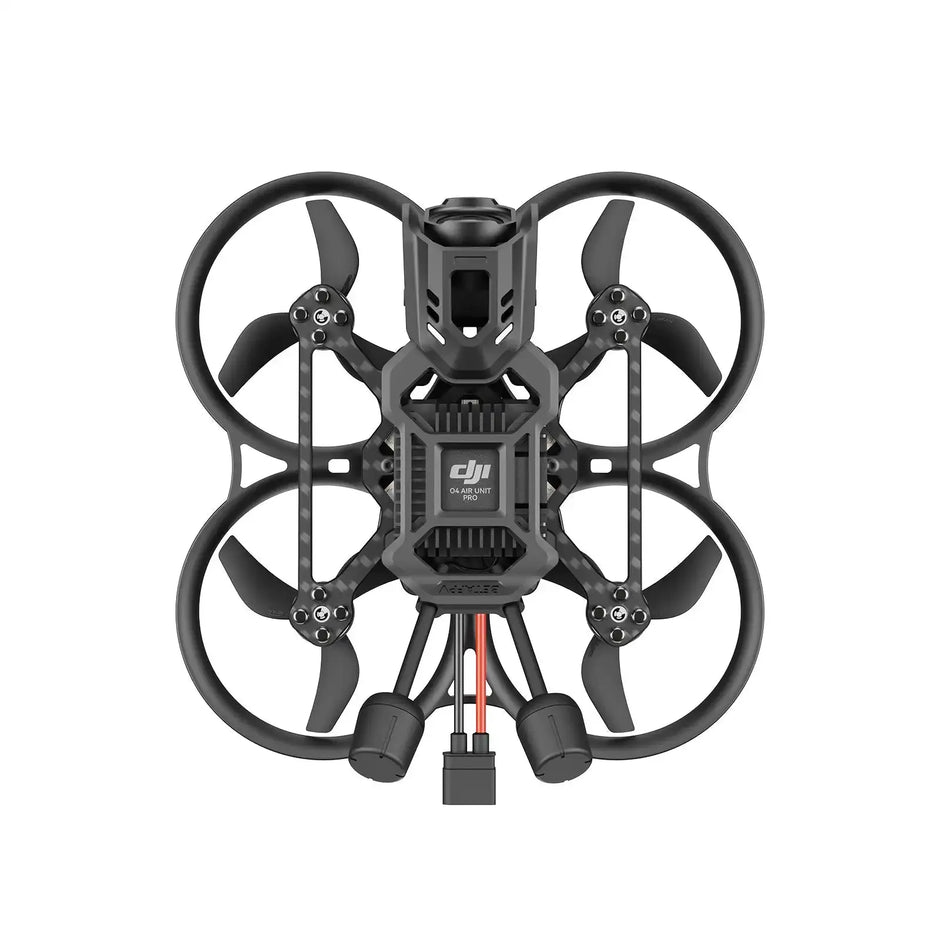 Top view of the BETAFPV Pavo20 Pro II Brushless Whoop Quadcopter by HeadphoneHeat, a compact black drone with four propellers in circular guards, 4K UHD camera housing, and two connector cables extending below.