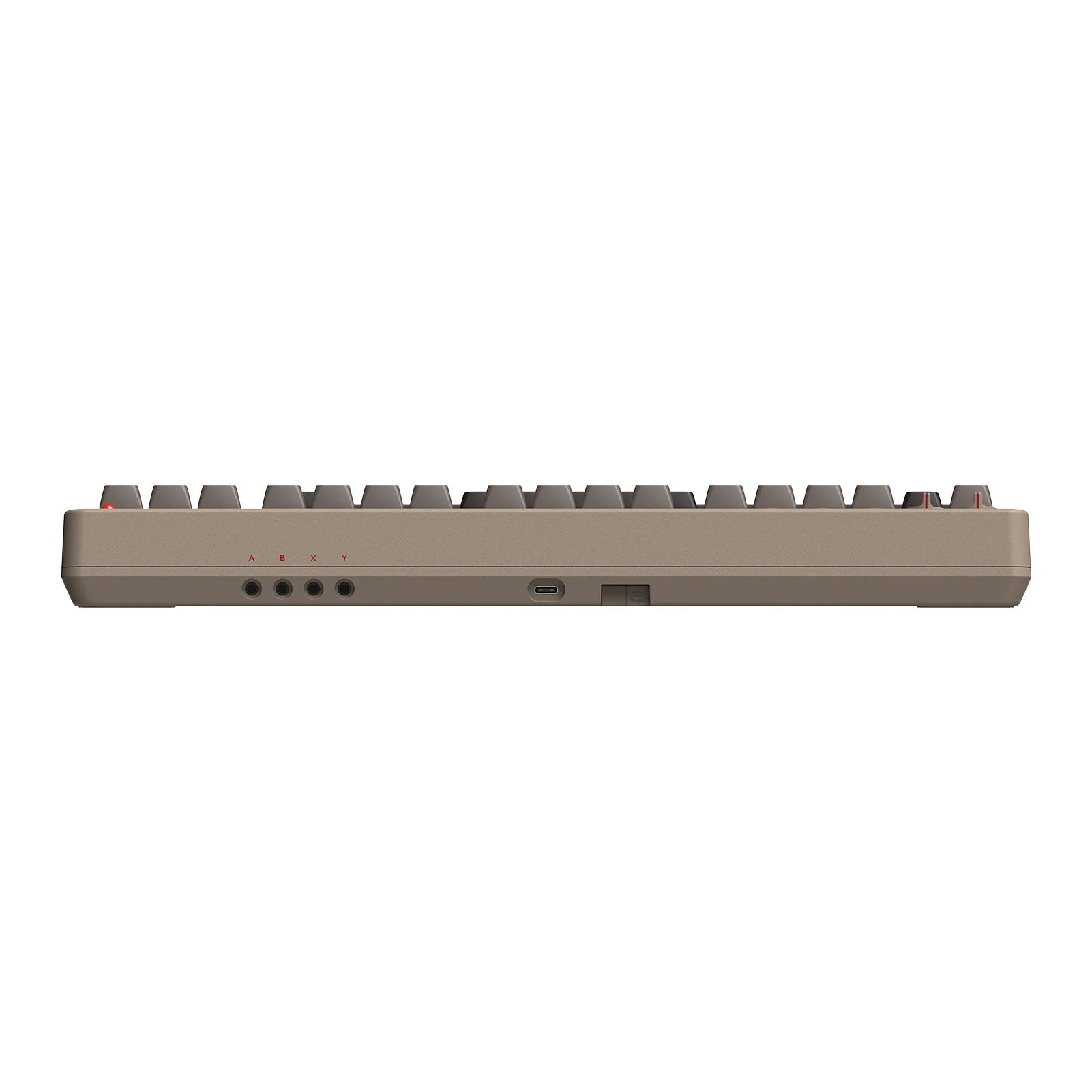 Side view of the 8BitDo Retro Mechanical Keyboard by HeadphoneHeat, showcasing its compact and minimalist design. It features a USB-C port, power switch, and LED indicators, with keys that are slightly elevated to highlight its slim profile reminiscent of classic 8Bitdo aesthetics.