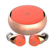 A pair of HeadphoneHeat Bluetooth Kenteen’s 5.1 Earbuds and their charging case are displayed against a white background. The case is circular, with a shiny, metallic finish and a bright orange top. Featuring dual driver technology, the orange earbuds have metallic accents and are marked with an 