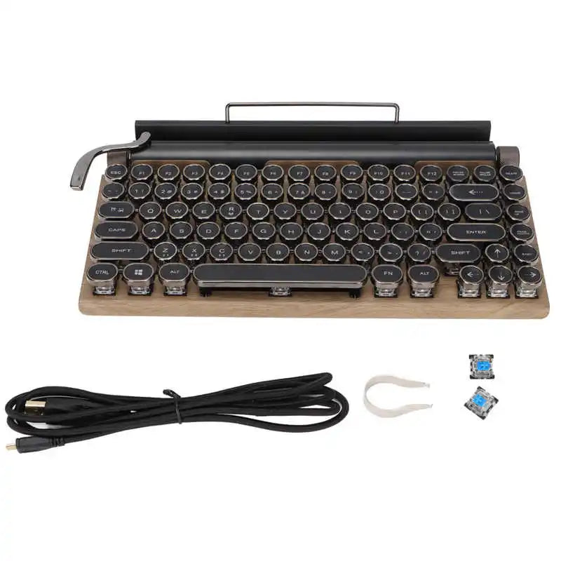 The Retro Typewriter Mechanical Keyboard by HeadphoneHeat is a retro-style device with round keys, resembling a typewriter. It features Bluetooth 5.0, includes a black USB cable, white keycap puller, and two extra key switches for added convenience.