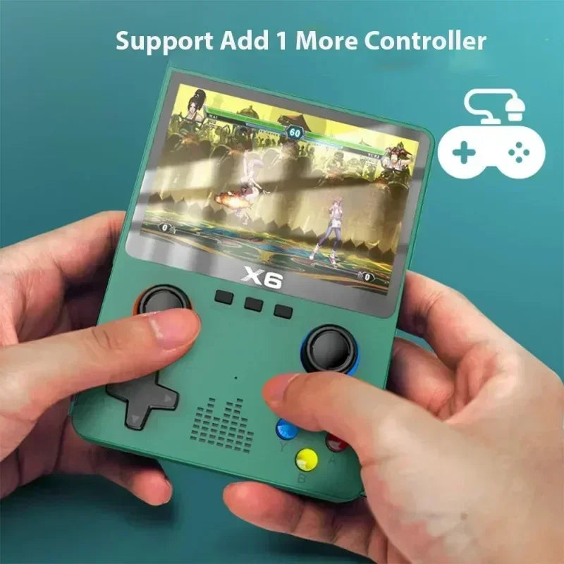 A pair of hands grasps the EVANOVM X6 Retro Game Console by HeadphoneHeat, an eye-catching green device showcasing a fighting game. Featuring dual joysticks and a range of buttons, it promises the joy of portable gaming. Above, the text reads 