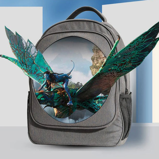 The BSIDE 3D Holographic Projector Backpack by HeadphoneHeat showcases a stunning three-dimensional circular image of a blue, humanoid creature riding a winged creature with vibrant green wings. The background depicts a fantastical, floating rock landscape in high-resolution display. This gray backpack also features a black handle and side pockets for added convenience.