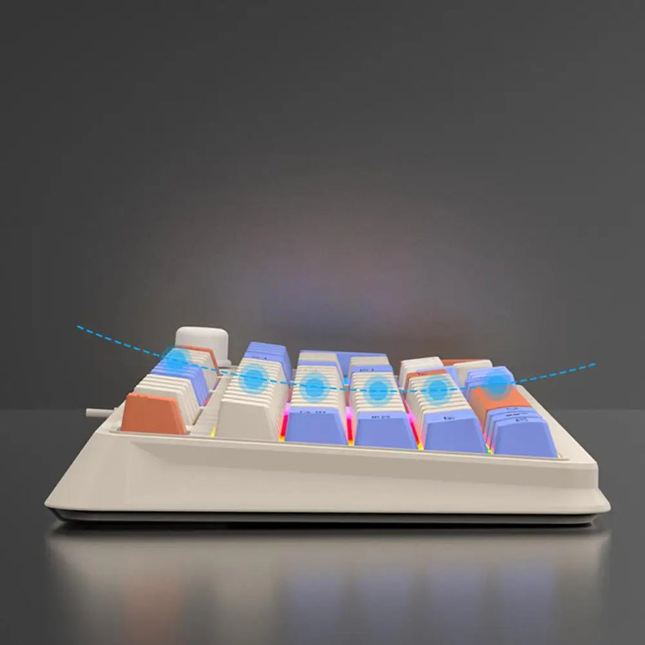 A side view of the HeadphoneHeat K82 Mechanical Gaming Keyboard showcases its colorful keycaps, featuring a gradient of blue, white, and orange. The backlighting on this wired mechanical keyboard radiates in shades of pink and blue, creating a vibrant effect against the dark background.