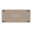 The image displays the back of a beige electronic device with rubber grips on the corners, reminiscent of an 8BitDo Retro Mechanical Keyboard design by HeadphoneHeat. It includes a label with text and symbols in the center and features a hinge-like detail at the top, enhancing its retro mechanical keyboard aesthetic.