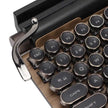 The Retro Typewriter Mechanical Keyboard by HeadphoneHeat combines retro style with modern functionality, featuring authentic key clatter that offers a tactile experience akin to using a traditional typewriter.