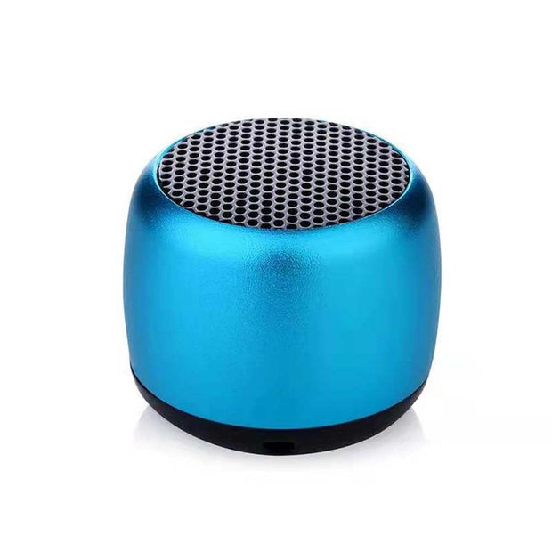 A compact, metallic blue Portable Mini Bluetooth Speaker from HeadphoneHeat.Com features a rounded shape and black circular speaker grille on top, delivering high-quality sound against a plain white background.