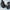 A pair of black V5.3 Over-Ear Headphones Lightweight Fit by HeadphoneHeat with air passing through the ear cushions shows breathability. Text: 