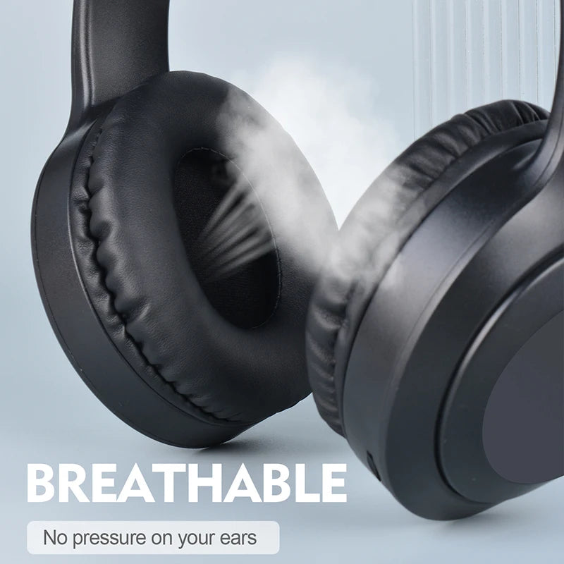 Close-up of HeadphoneHeat V5.3 Over-Ear Headphones with vapor passing through cushions, showing breathability and wireless Bluetooth connectivity. Text on image: "BREATHABLE - No pressure on your ears." Lightweight Fit design.