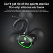 HeadphoneHeat's TWS Newmsnr UFO Halloween Earbuds, in sleek black with green LED accents and non-slip silicone ear hooks, are showcased against a textured dark background. Utilizing Bluetooth 5.1 technology, the description underscores their ergonomic design and comfort, highlighting a secure fit ideal for sports activities.