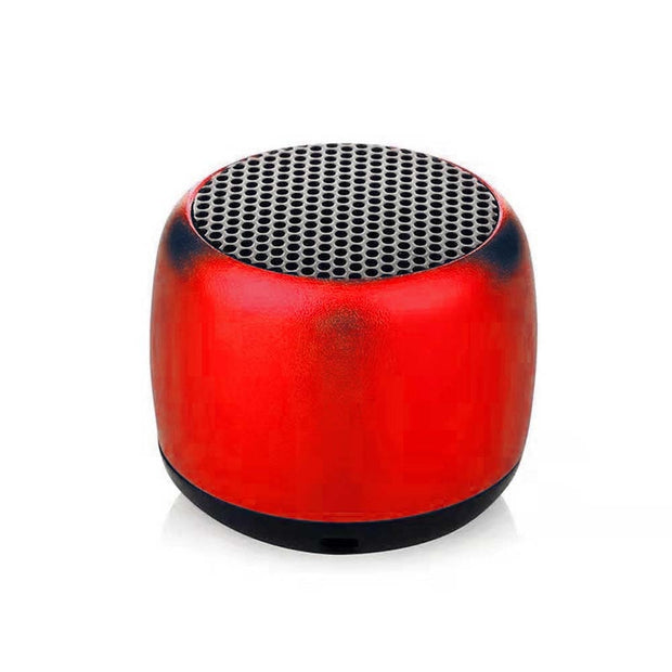 The Portable Mini Bluetooth Speaker by HeadphoneHeat.Com is a compact, round, red device with a black mesh top and base, offering high-quality sound, shown isolated on a white background.