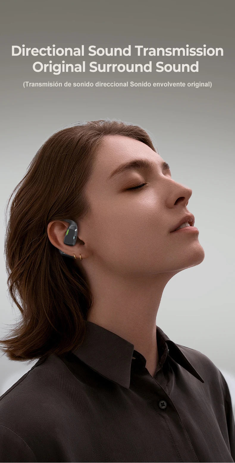 A person with shoulder-length brown hair is wearing a dark button-up shirt and the AI Earphone Translator Erazer XP6 Bluetooth Earphones from HeadphoneHeat. They appear relaxed, with eyes closed, against a neutral background. Text above reads: 