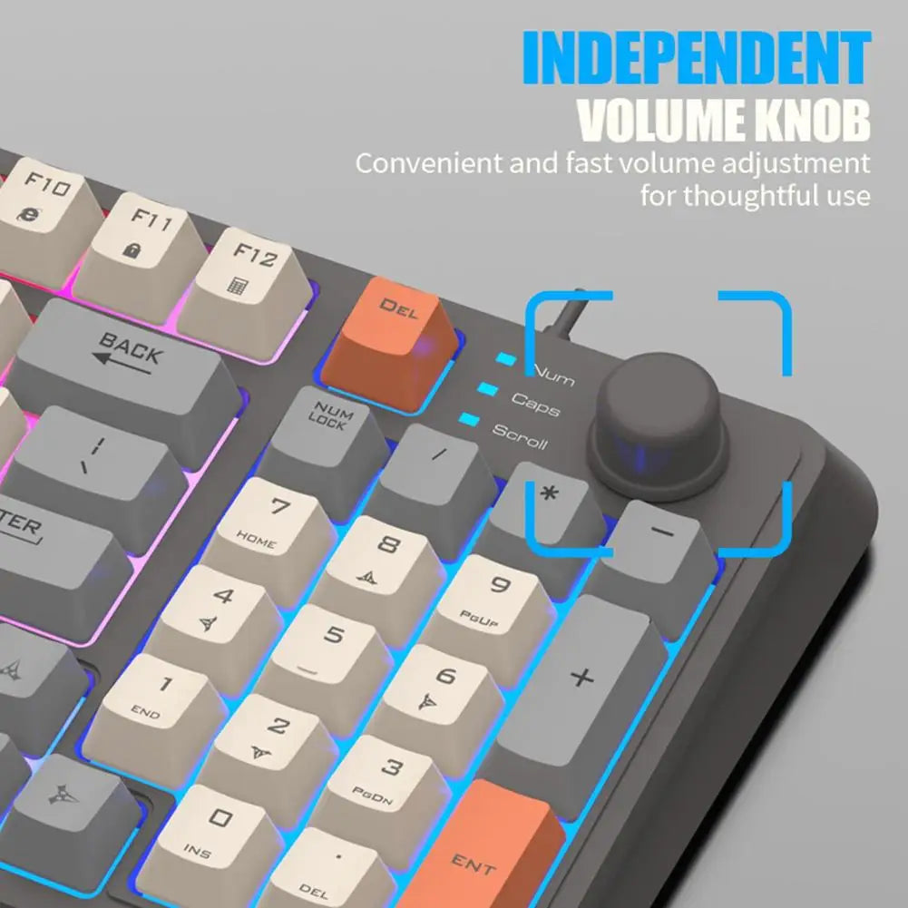 A close-up of the K82 Mechanical Gaming Keyboard from HeadphoneHeat highlights its independent volume knob. This wired gaming keyboard features colorfully backlit keys, underscoring the ease of adjusting audio with a simple twist.