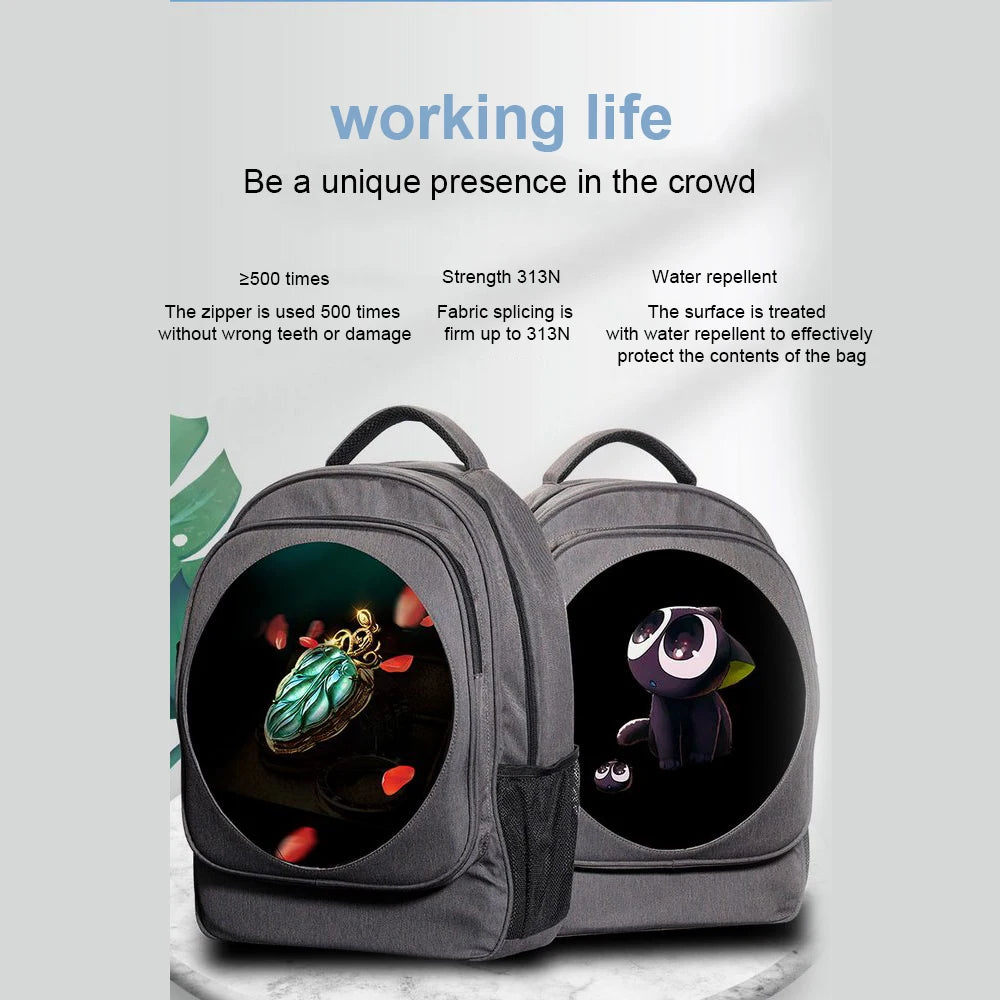 Two grey BSIDE 3D Holographic Projector Backpacks by HeadphoneHeat are displayed side by side against a light background. Each backpack features a circular design on the front; one showcases an image of an insect on a flower, while the other depicts a cartoon animal. Text above highlights features such as durability, water repellency, and certified quality.