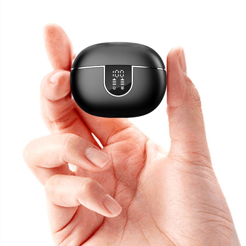 A hand holds a small, black Dropshipman Ultra-long Premium earbuds charging case with a digital display on the front, shown against a white background.