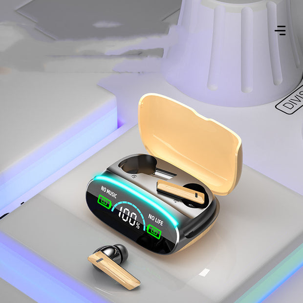 A pair of Dropshipman Wood Grain Wireless Bluetooth Earbuds with a gold and black look sit in an open charging case, which shows "100%" battery and "NO MUSIC NO LIFE" on its LED display.