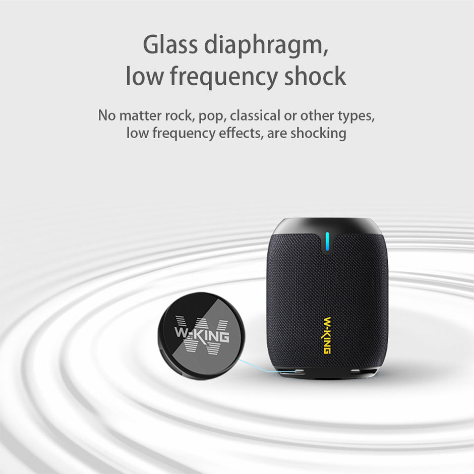 Image of a sleek black 15W Mobile Wireless Bluetooth Speaker by HeadphoneHeat. The background has a ripple effect, while the text emphasizes its glass diaphragm for high-quality sound and "low frequency shock," perfect for mobile music lovers.