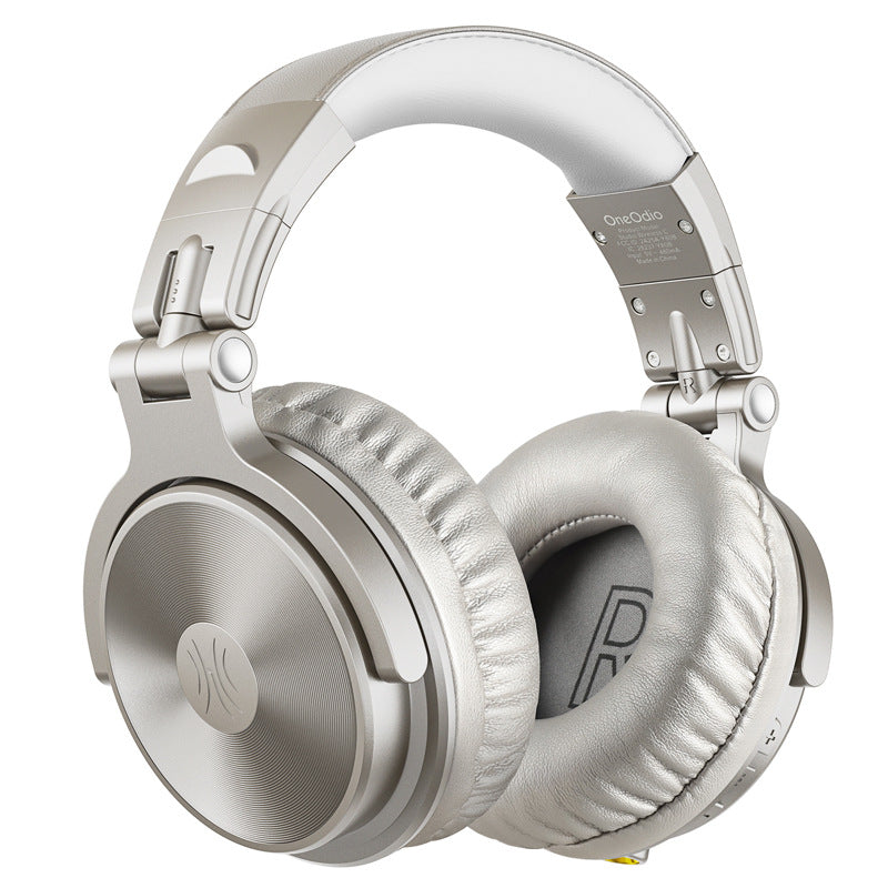 The Dropshipman OneOdio Wireless Headset features a silver over-ear Bluetooth design with cushioned ear pads, padded headband, foldable structure, metallic accents, and circular embossed logo for studio-quality sound.