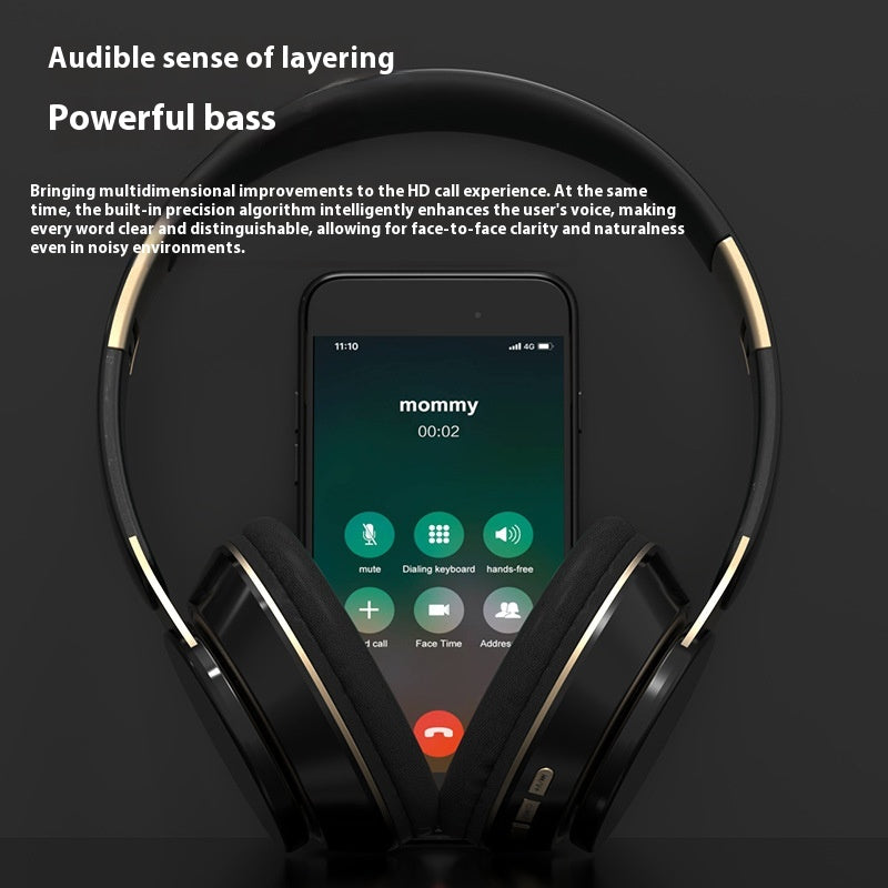 A smartphone showing an incoming call from "mommy" rests between the ear cups of Dropshipman F10 Wireless Headphones in black and gold, highlighting powerful bass, long battery life, and enhanced voice clarity.